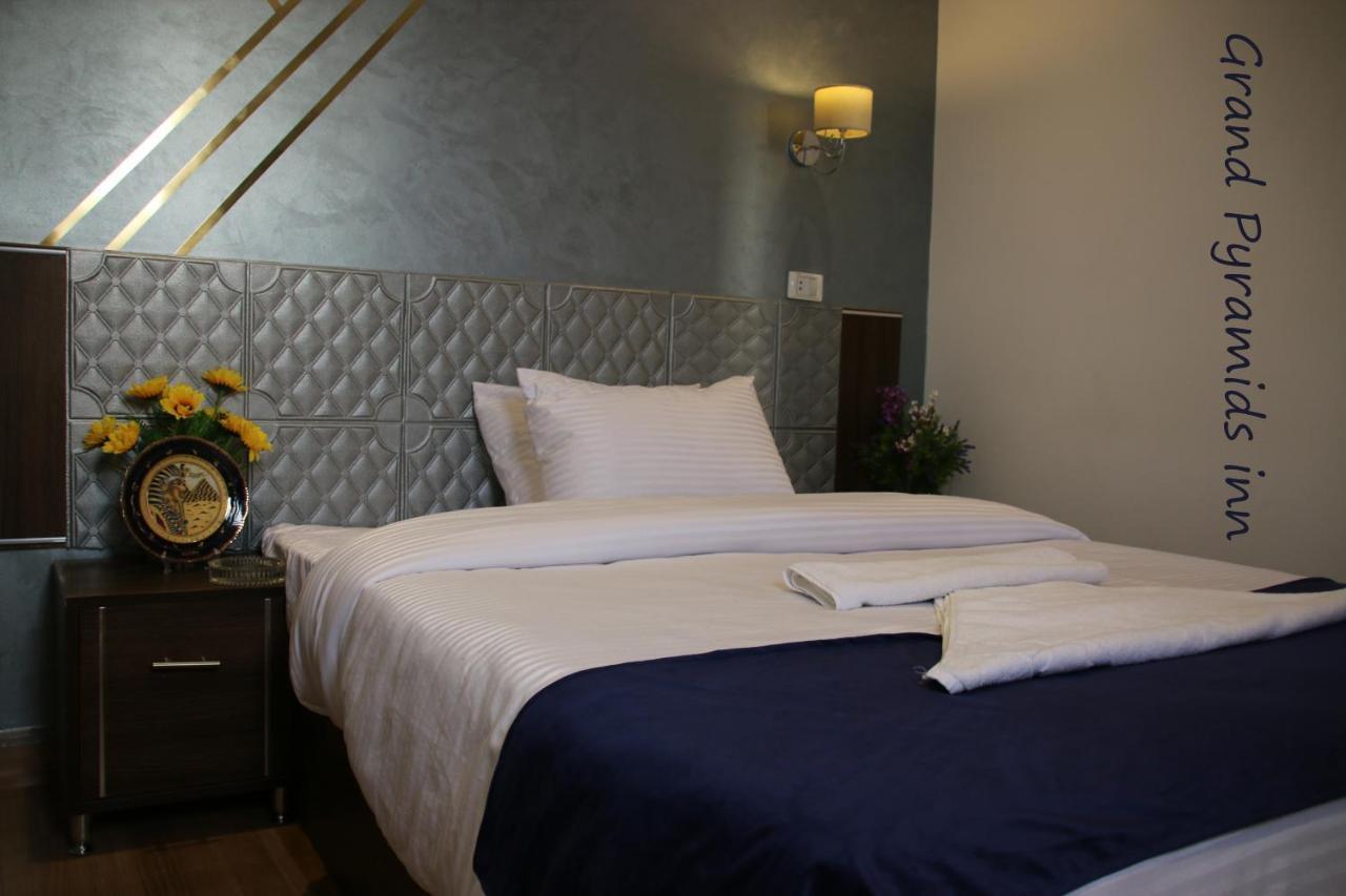 Grand Pyramids Inn Kafrat al Jabal ภายนอก รูปภาพ