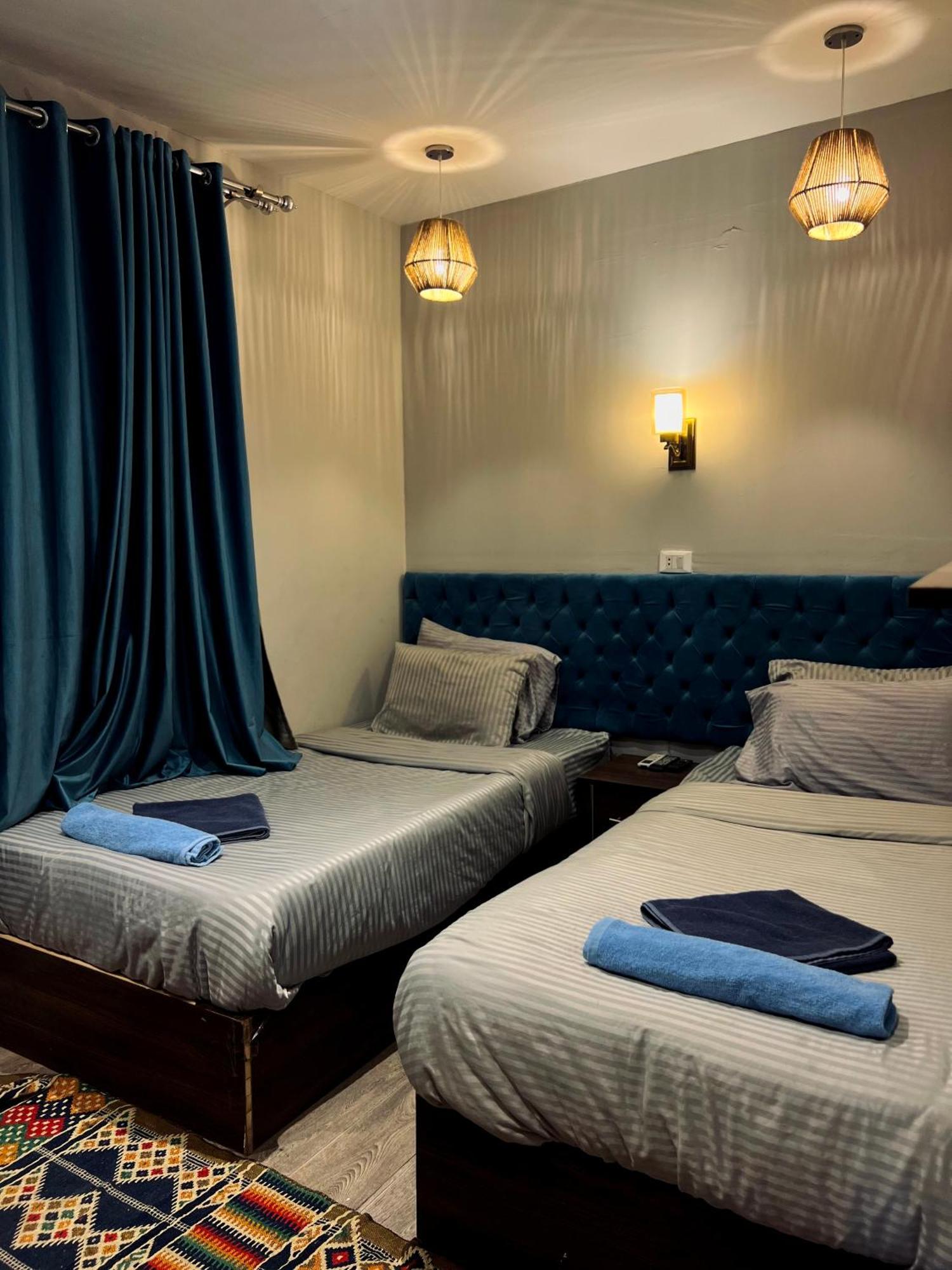 Grand Pyramids Inn Kafrat al Jabal ภายนอก รูปภาพ